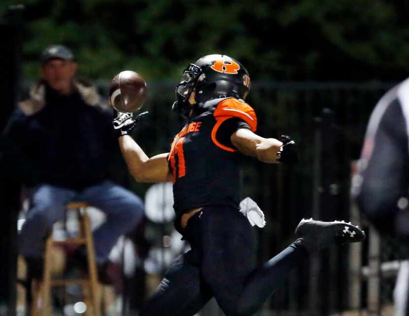 Rockwall receiver Jaxon Smith-Njigba (11) makes a one-handed catch against Mesquite at...