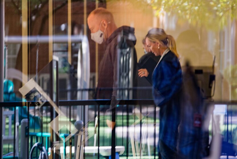 Voters cast ballots at the University Park United Methodist Church in Dallas the morning of...