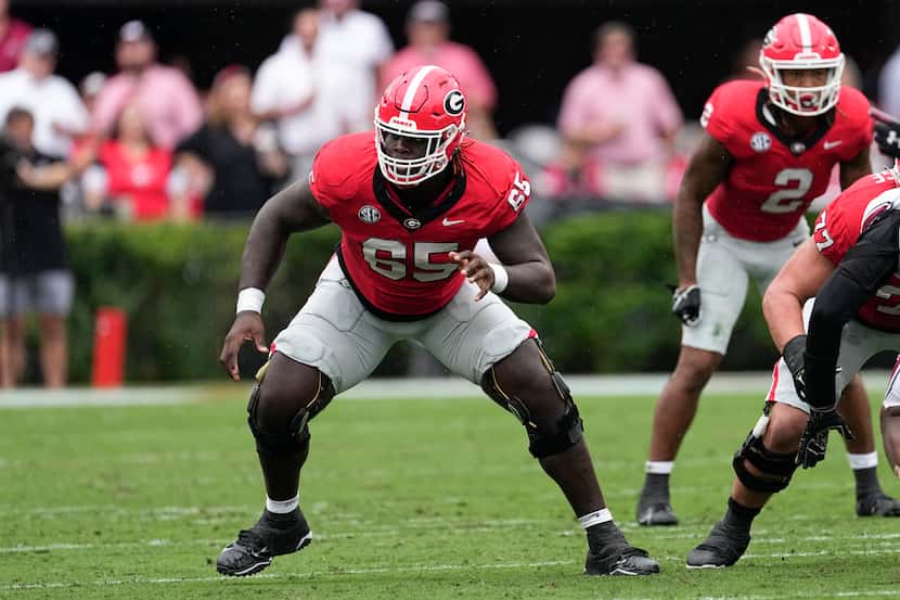 Georgia offensive lineman Amarius Mims (65) is shown against South Carolina during the first...