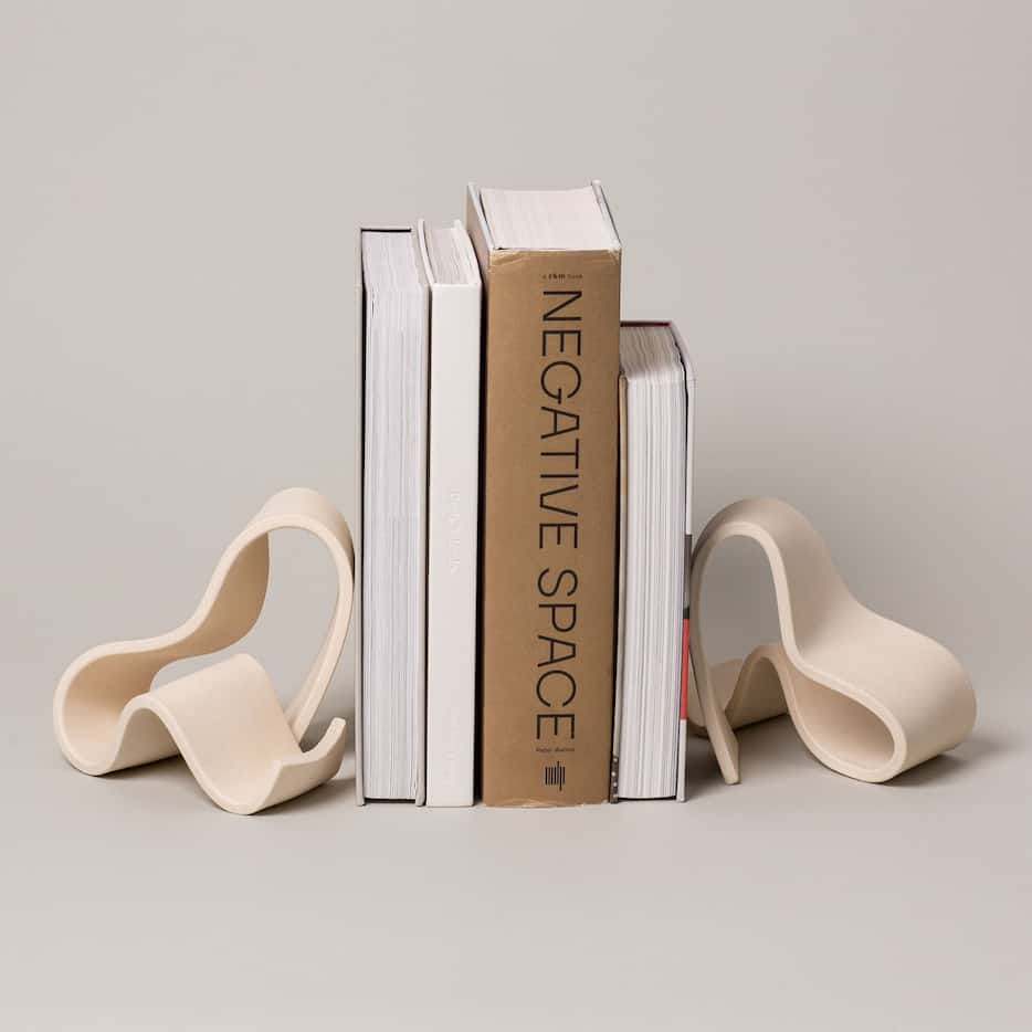 Abstract sculptural bookends around several books