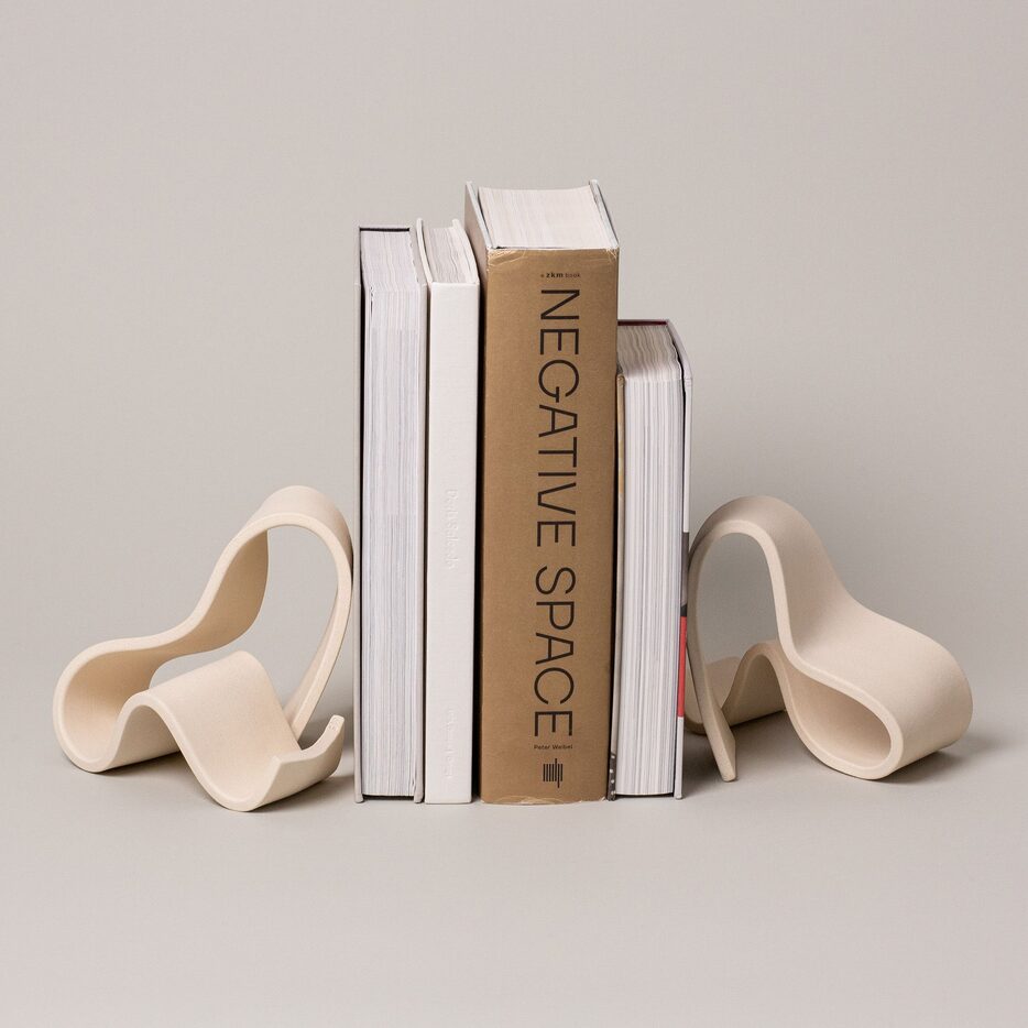 Abstract sculptural bookends around several books