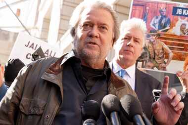 Steve Bannon, center, a longtime ally of former President Donald Trump and convicted of...