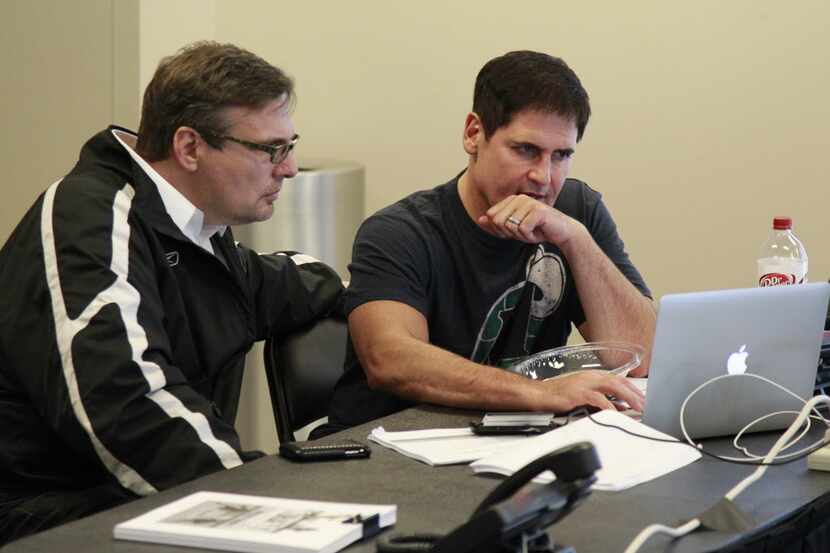 Dallas Mavericks General Manager Donn Nelson and owner Mark Cuban, in the draft war room...
