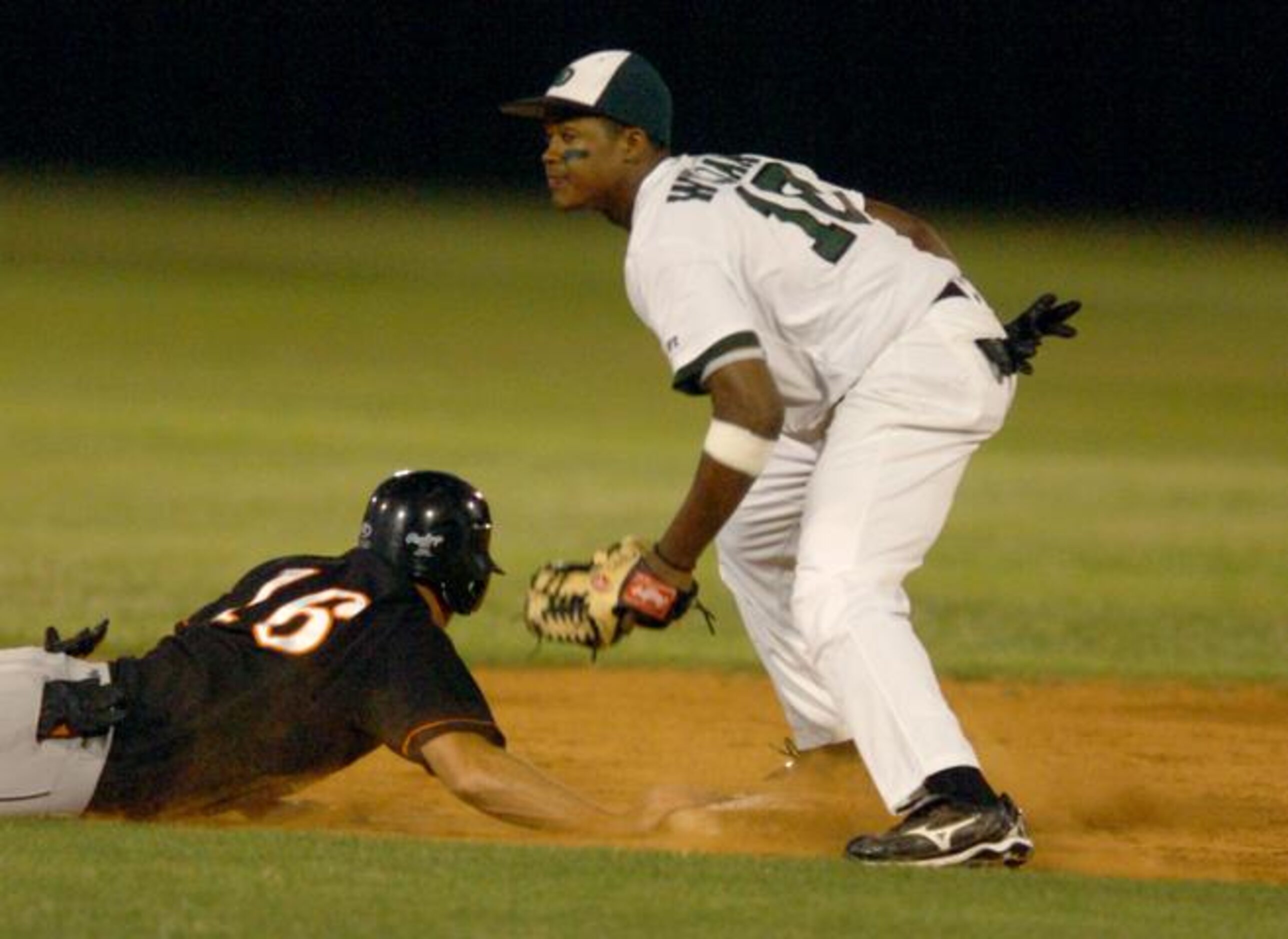 Lake Dallas' Dalyn Williams (10) makes a tag at second on Aledo's Ryan Talley (16), Friday,...