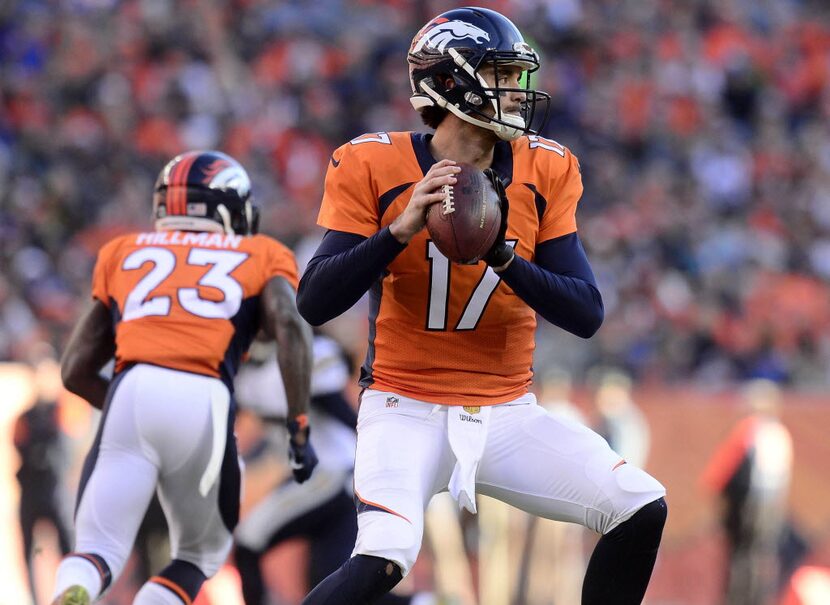 Jan 3, 2016; Denver, CO, USA; Denver Broncos quarterback Brock Osweiler (17) prepares to...