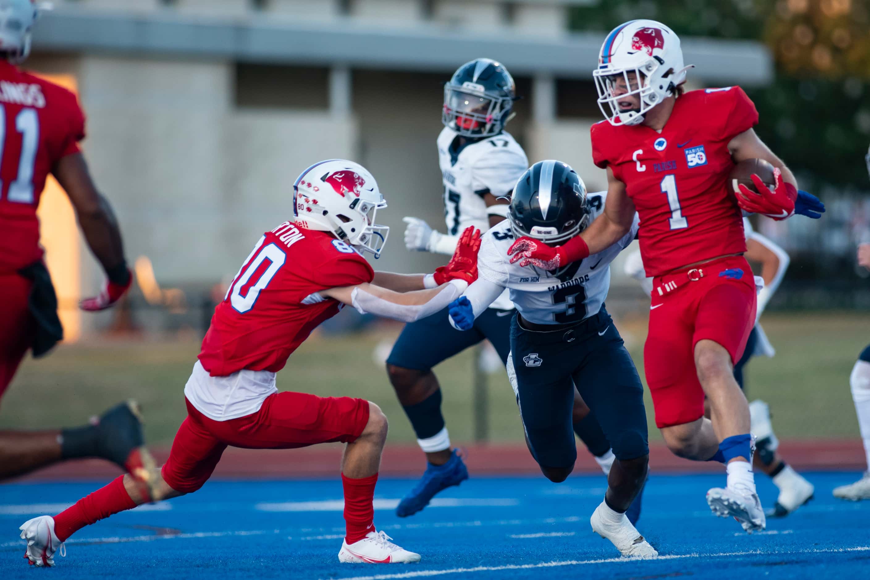 Parish Episcopal senior Blake Youngblood (1) looks to get around a defender as he gains...