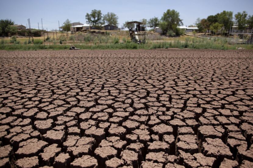 A dock stood on the dried bed of Lake Colorado City near Colorado City, Texas, in August...