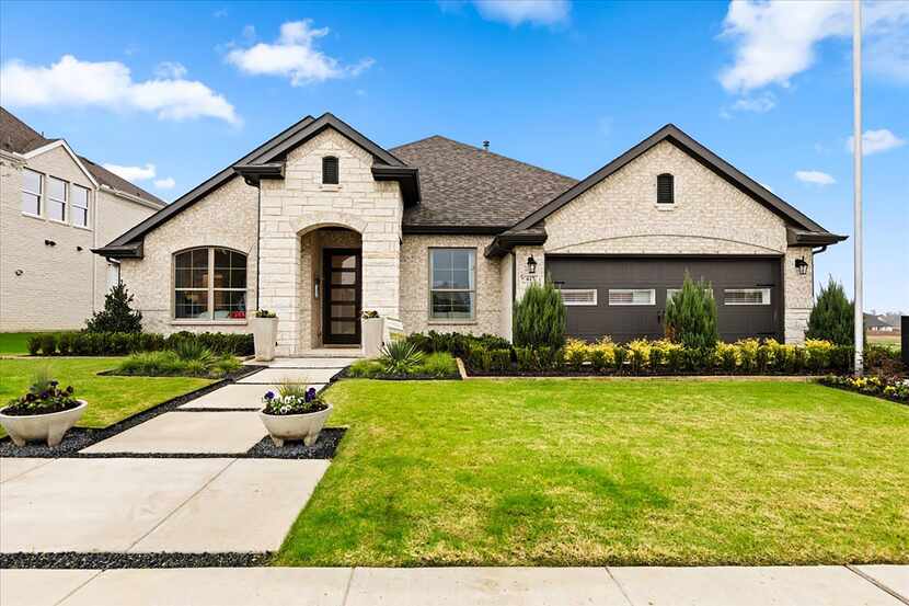 The Princeton plan at 617 Majestic Oak Lane in Waxahachie offers 2,699 square feet of living...