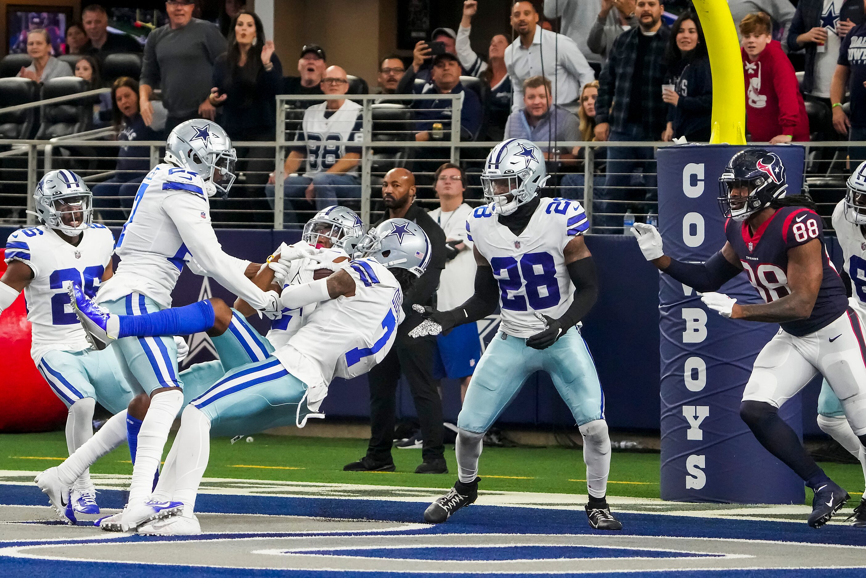 Dallas Cowboys safety Israel Mukuamu intercepts a hail-mary in the end zone the final...