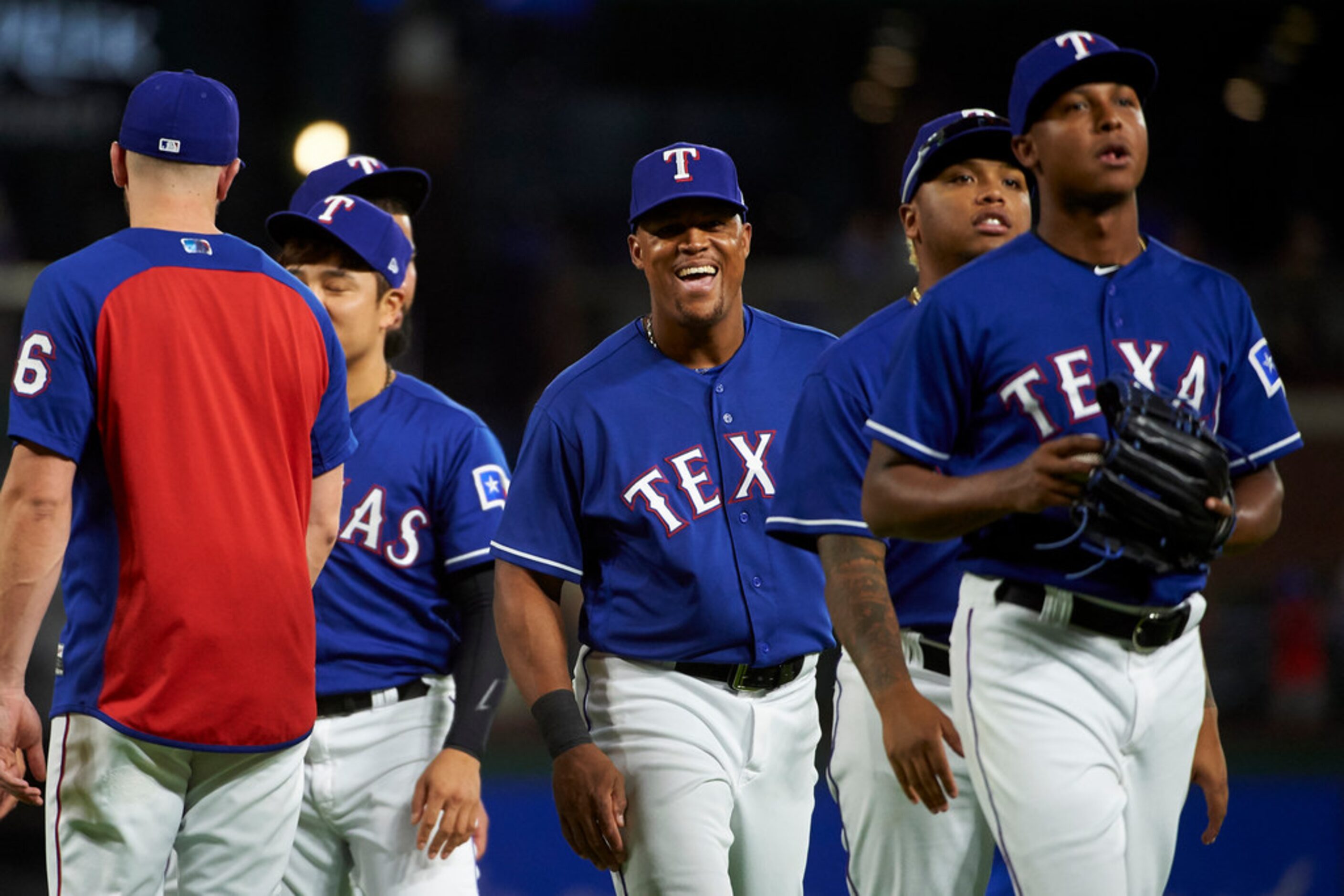 Texas Rangers' Adrian Beltre smiles as the Rangers celebrate after defeating the Baltimore...