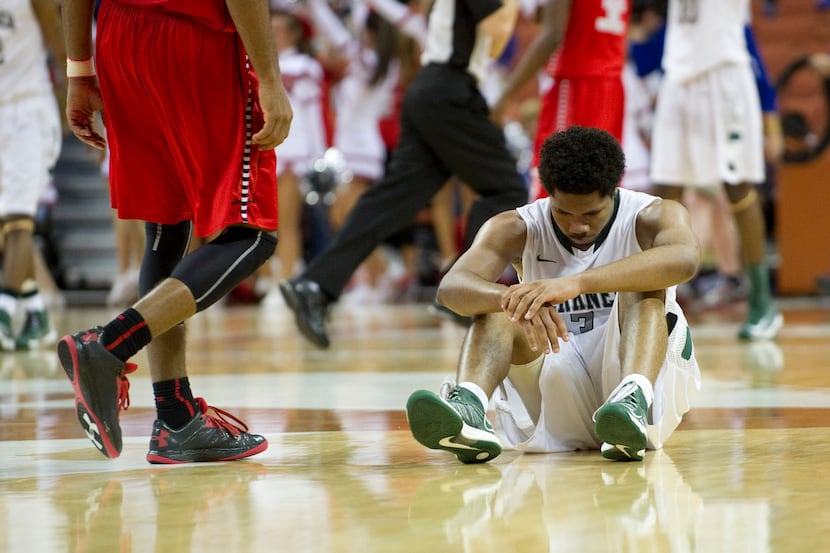 Tory Everett (3) of Richardson Berkner reacts after losing to Fort Bend Travis during the...