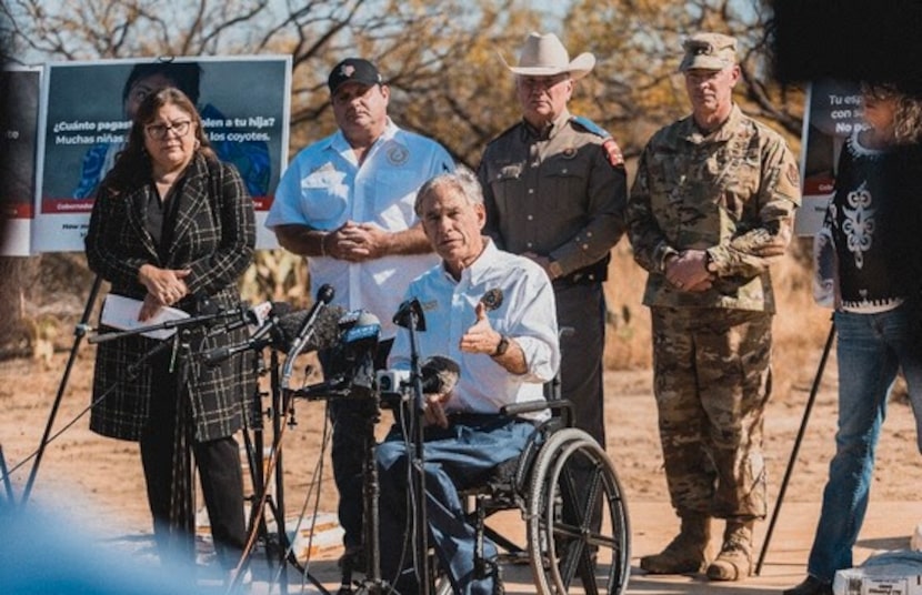 Texas Gov. Greg Abbott unveils a billboard campaign warning immigrants of the risks of...