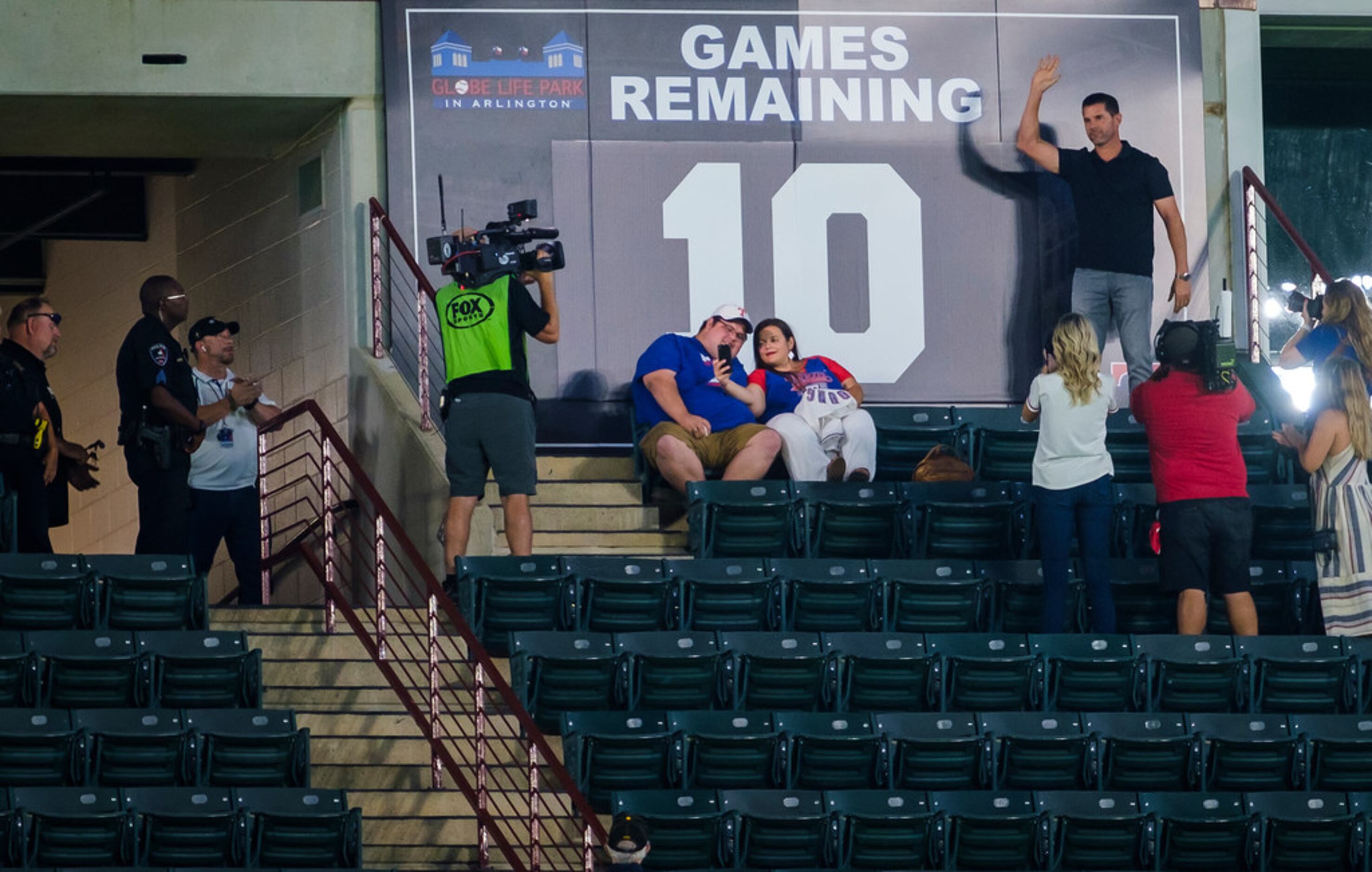 Michael Young unveils the the countdown showing 10 games remaining Globe Life Park during a...