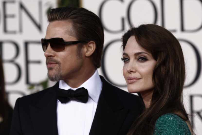 Angelina Jolie y Brad Pitt llegando a los Golden Globe Awards, el domingo 16 de enero de...
