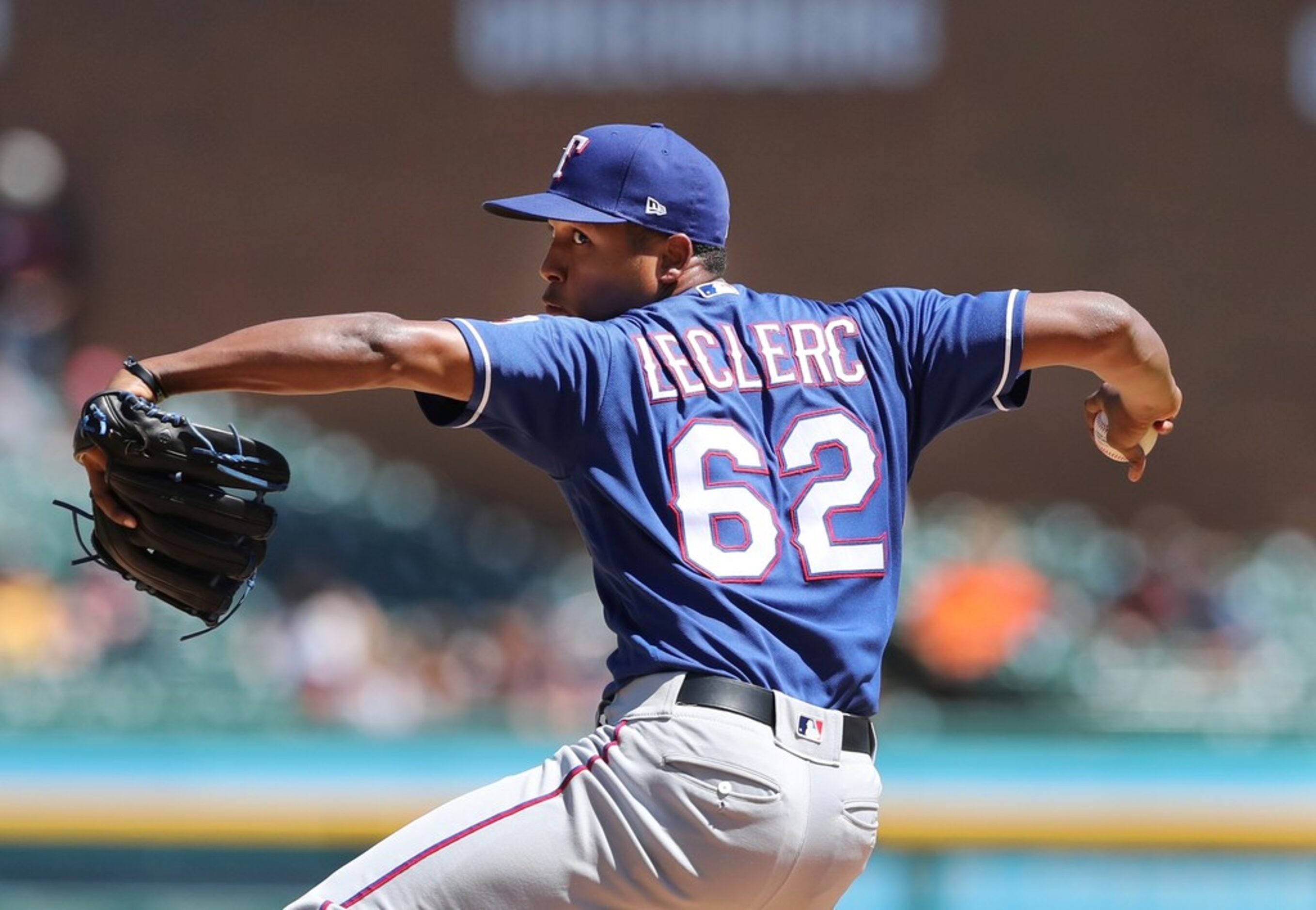 Texas Rangers relief pitcher Jose Leclerc throws during the seventh inning of a baseball...