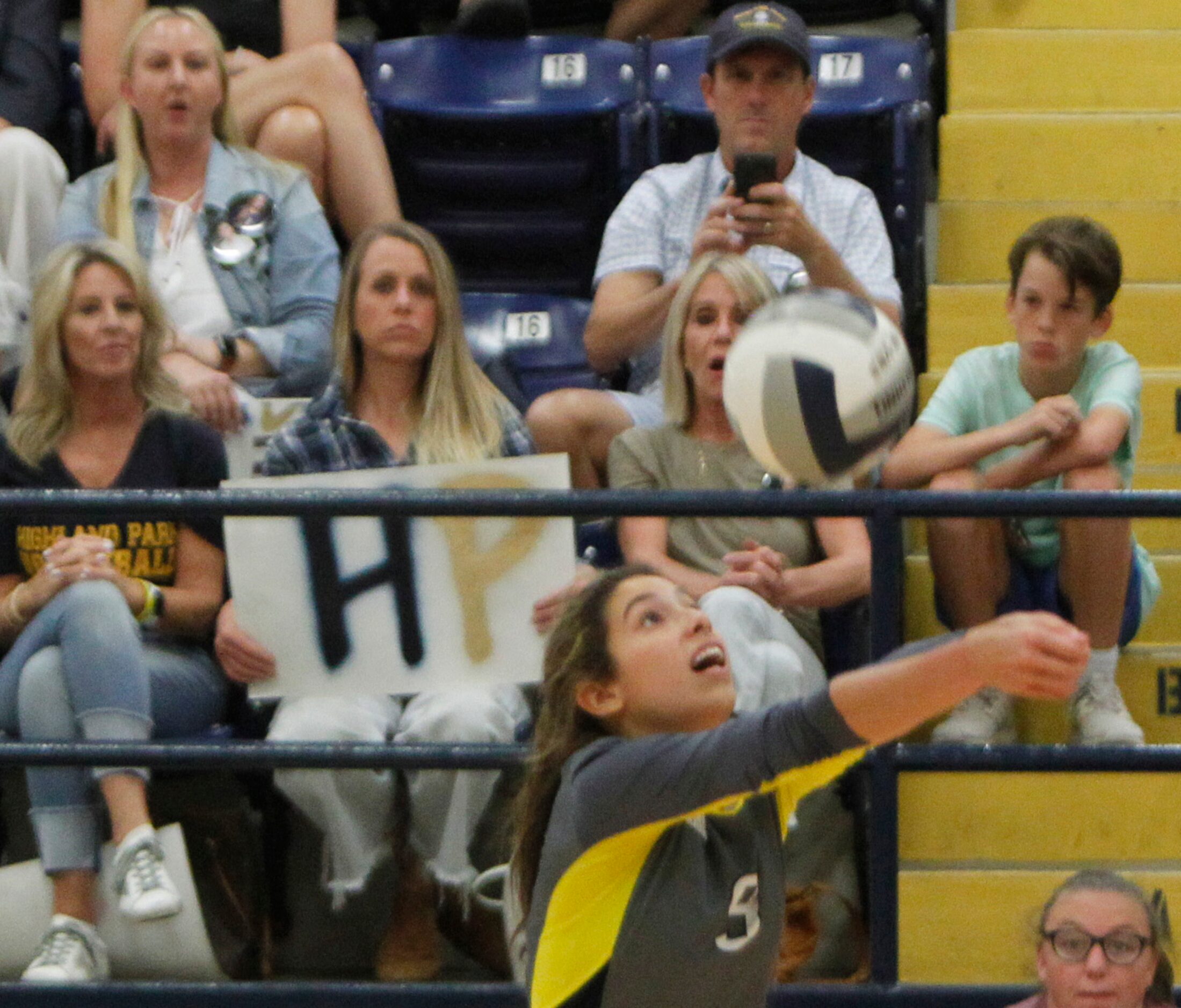 Highland Park setter Gracie Braner (9) focuses on the ball during the 3rd set of their match...