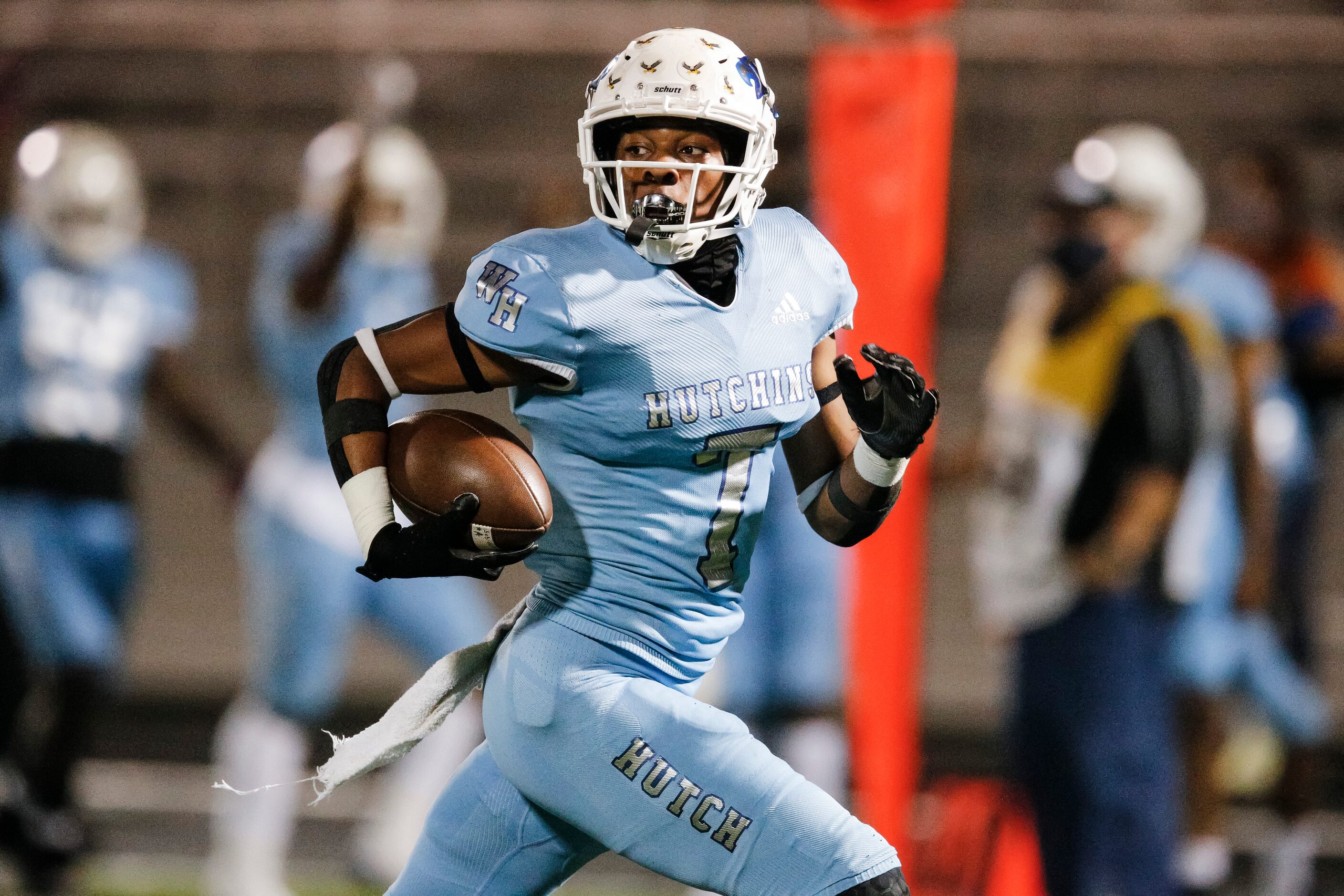 Wilmer-Hutchins senior wide receiver Jalin Moore (7) runs a pass in for a touchdown during...