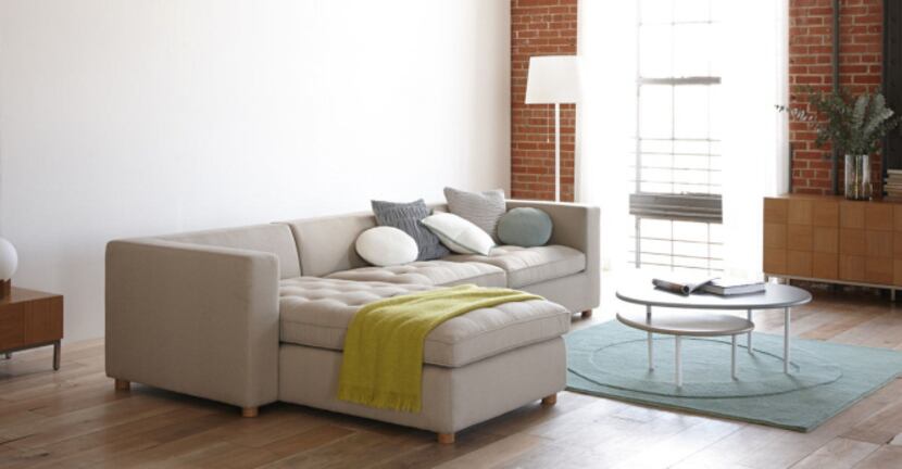 Sir Terence Conran's designs include his Heath modular sectional ($4,245), pillows ($45 to...