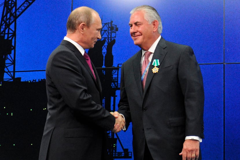 Rex Tillerson (right), whom President-elect Donald Trump has nominated for the nation's top...