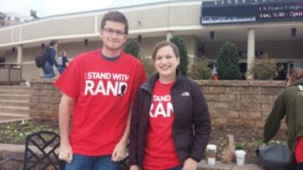  Liberty students Eli and Emily McGowan, a married couple, stump for Sen. Rand Paul before...