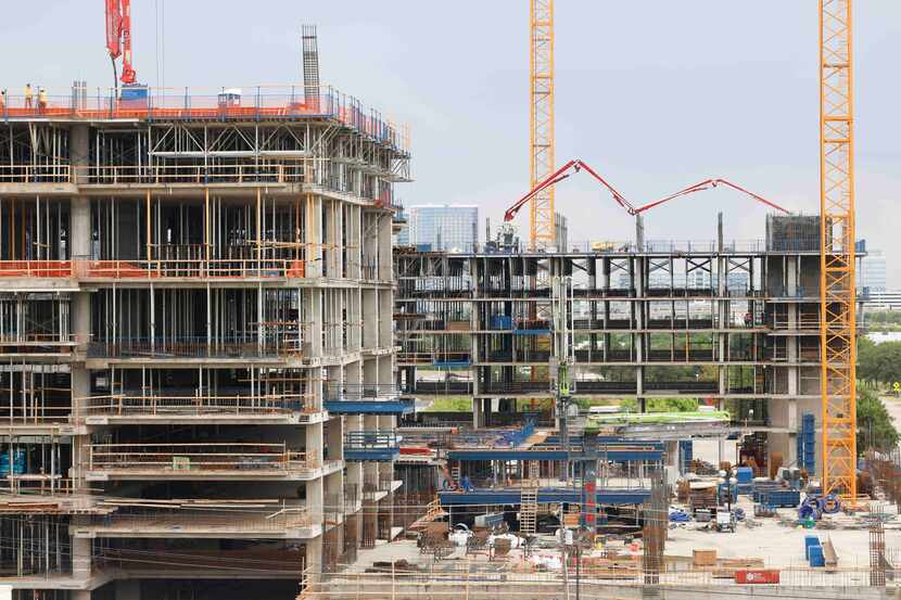 More than $8 billion in construction was underway in North Texas at midyear, including Hall...