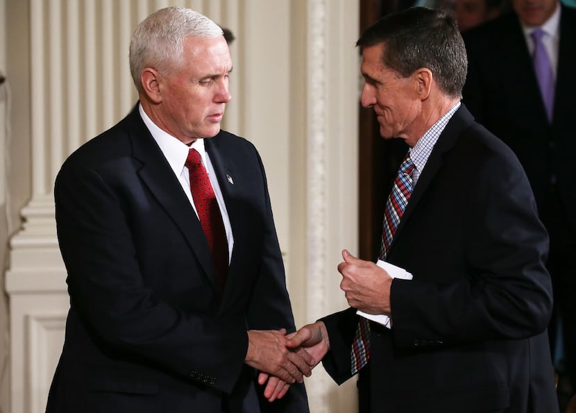 Vice President Mike Pence greeted National Security Adviser Michael Flynn on Friday, just...