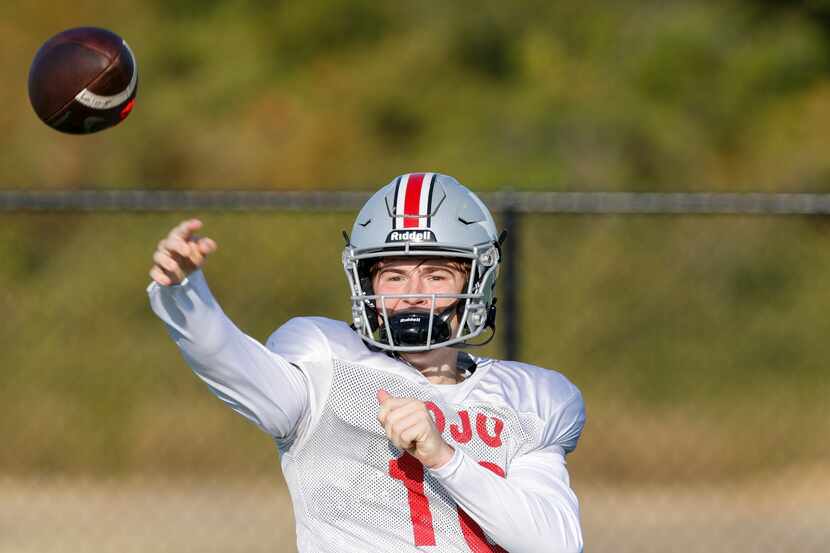 Lovejoy quarterback Alexander Franklin throws a pass during a morning practice at Lovejoy...