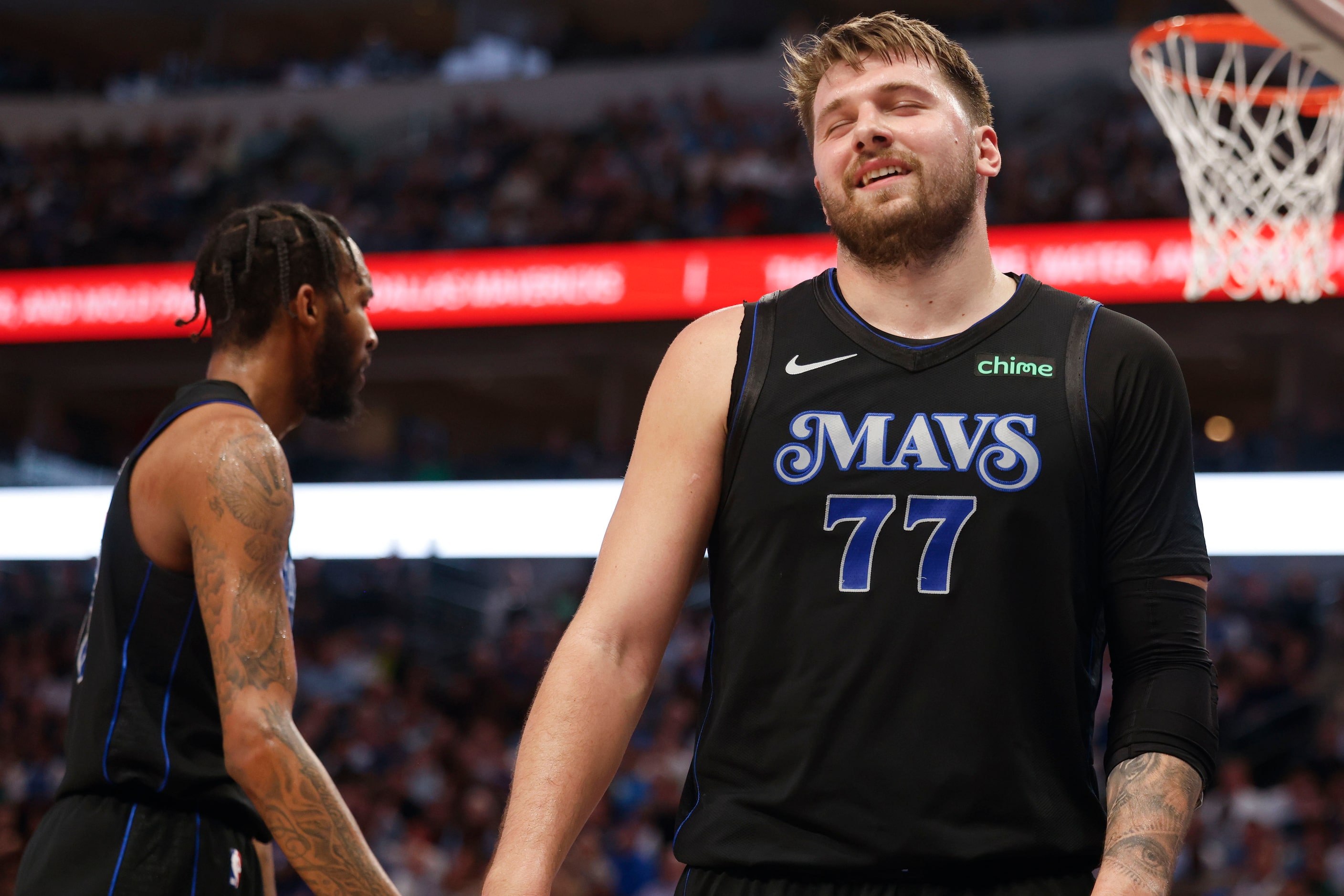 Dallas Mavericks guard Luka Doncic (77) reacts after he was denied a foul during the second...