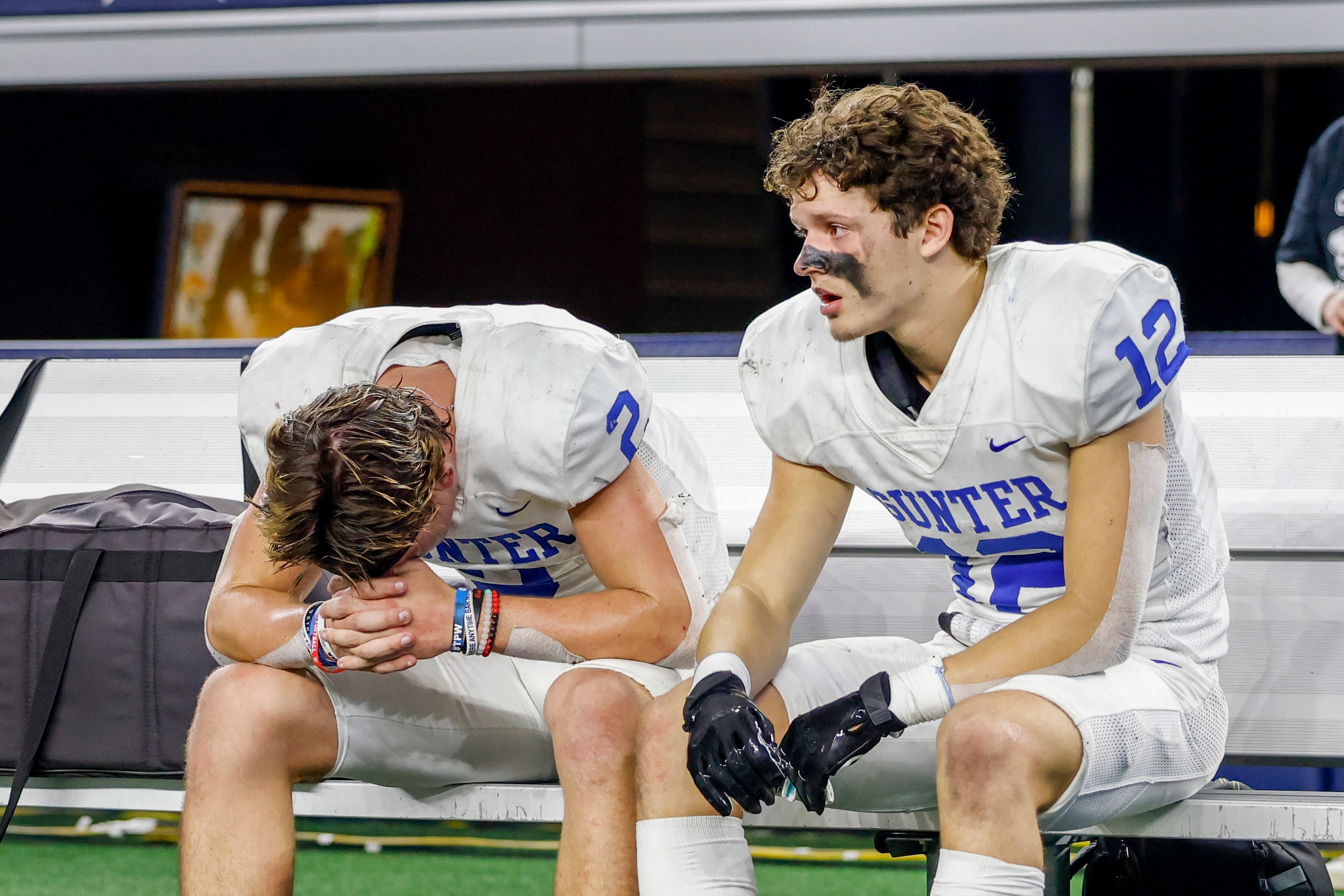 Gunter quarterback Hudson Graham (2) reacts after throwing an interception alongside Gunter...