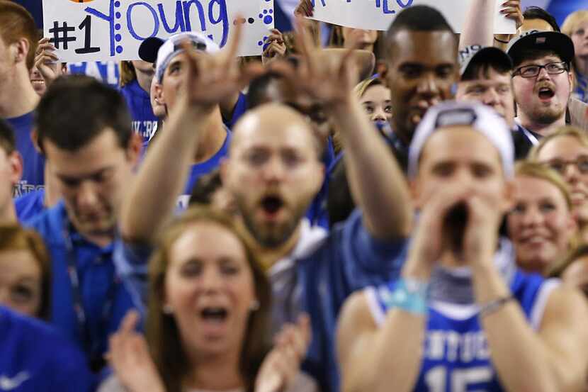 Kentucky Wildcats fans cheer for forward Julius Randle (30) in the first half of the...