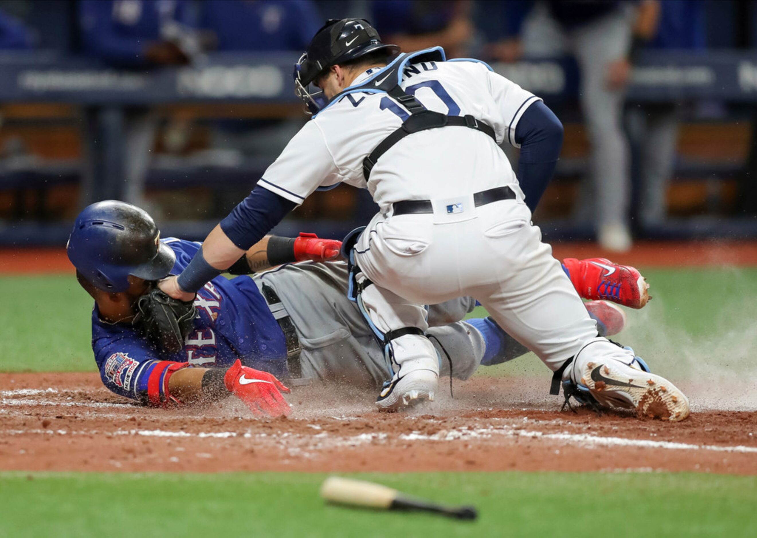 Tampa Bay Rays catcher Mike Zunino tags out Texas Rangers' Rougned Odor as he attempted to...