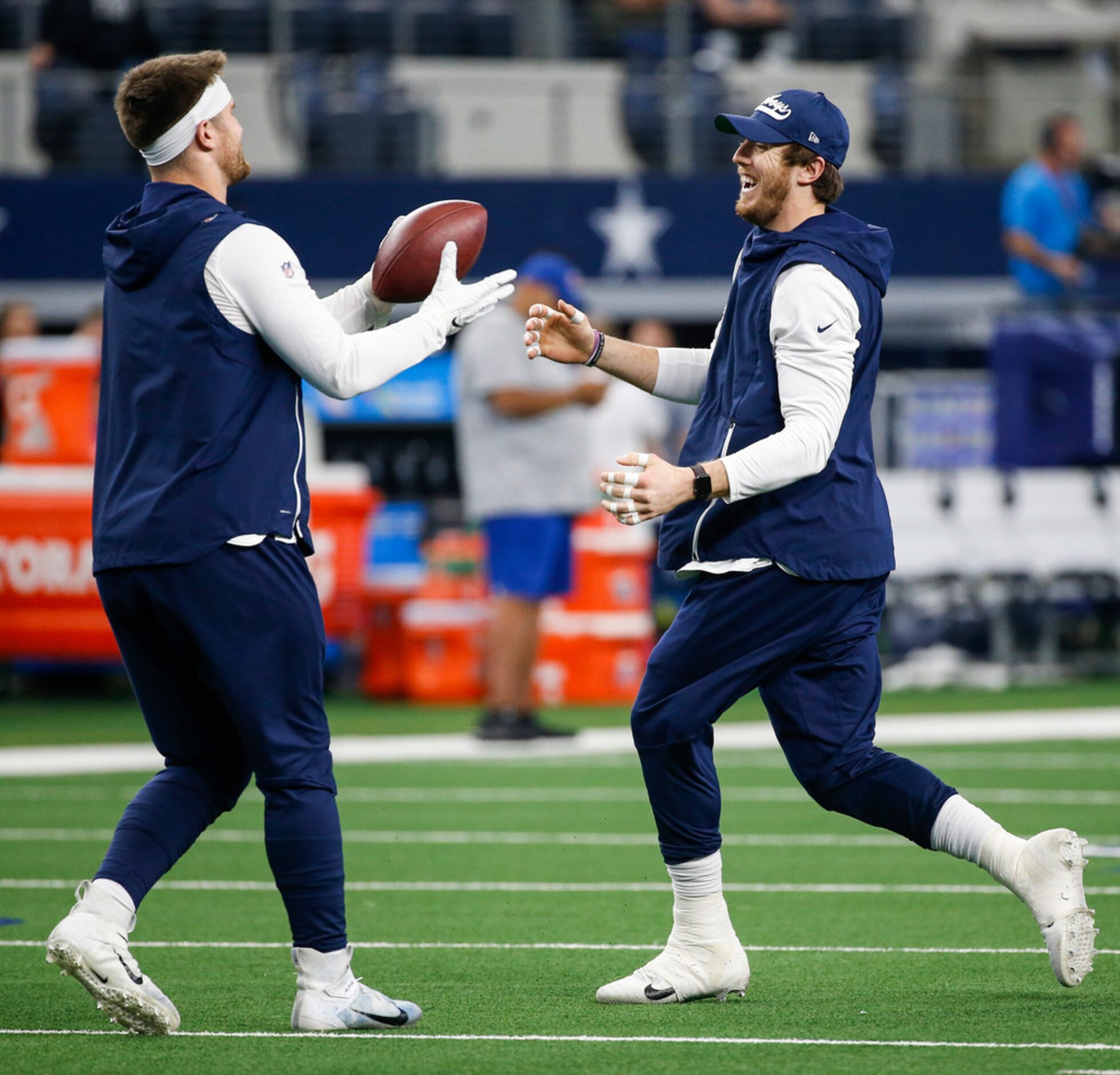 Dallas Cowboys tight ends Dalton Schultz, left, and Blake Jarwin warm up prior to an NFL...