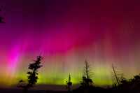 The Northern lights fill the sky at the Bogus Basin ski resort on Saturday, May 11, 2024 in...