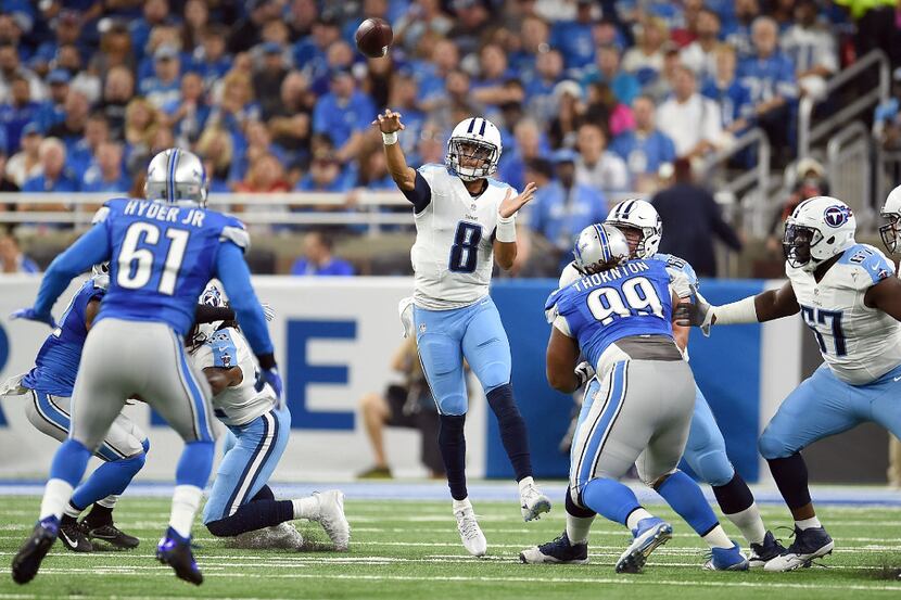DETROIT, MI - SEPTEMBER 18: Marcus Mariota #8 of the Tennessee Titans passes the ball...