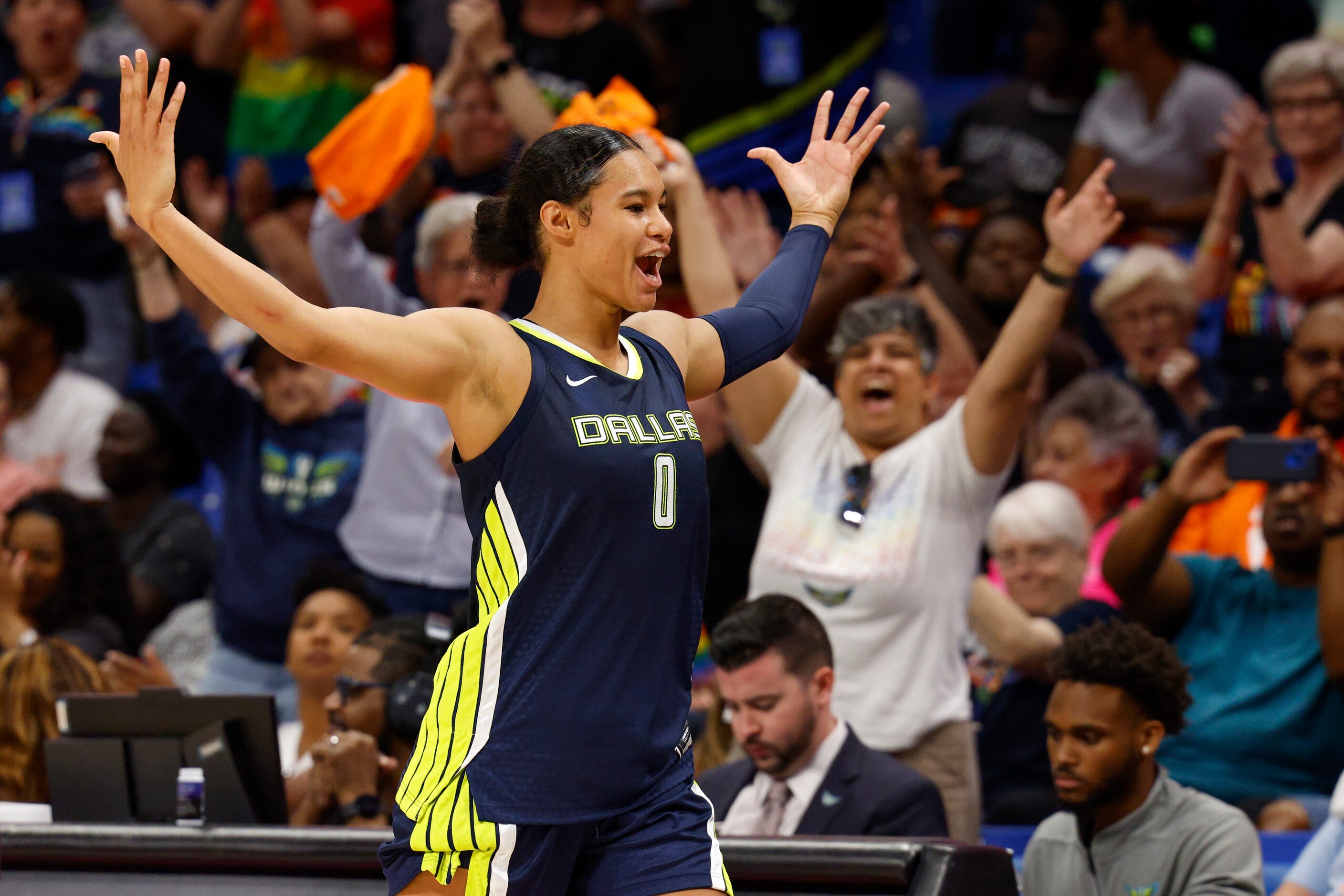 Dallas Wings forward Satou Sabally (0) pumps up the crowd as she heads to the bench during...