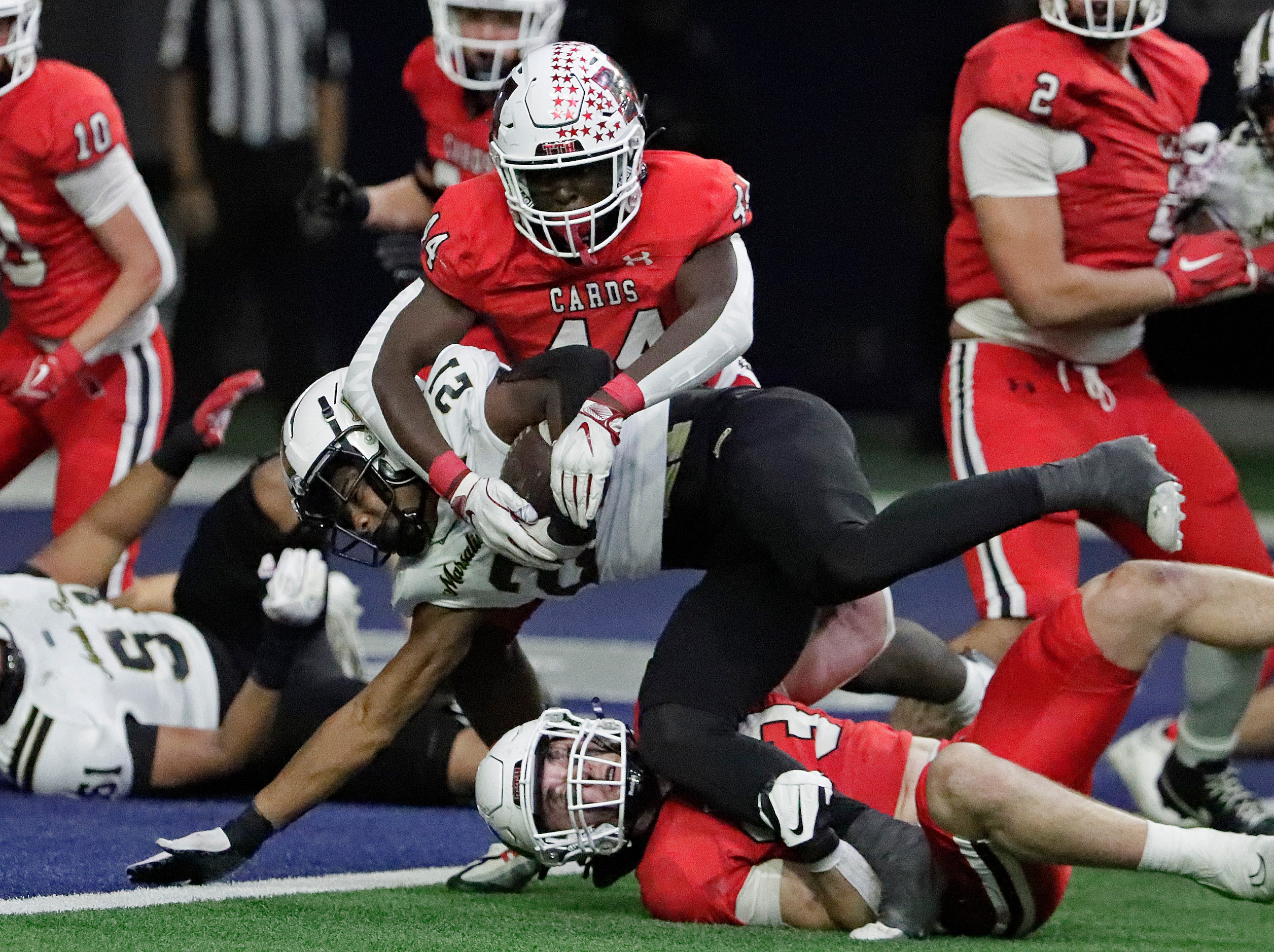 Melissa High School middle linebacker Micah Finan (33)  was unable to stop South Oak Cliff...