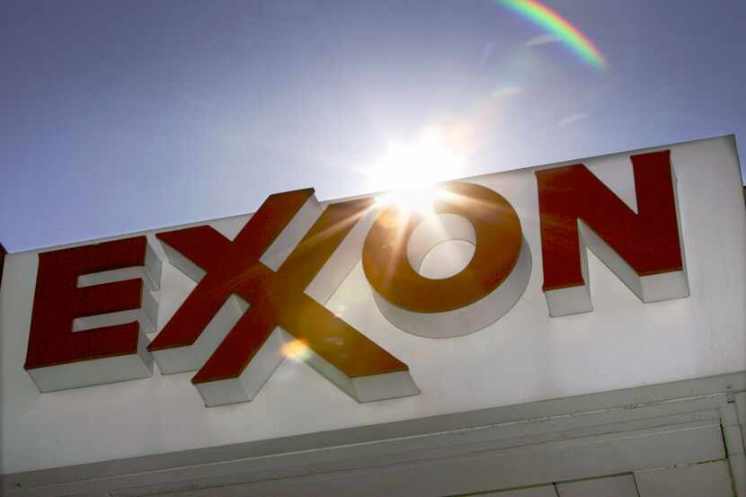 FILE - This Oct. 26, 2006, file photo shows an Exxon logo at a gas station in Dallas. Exxon...