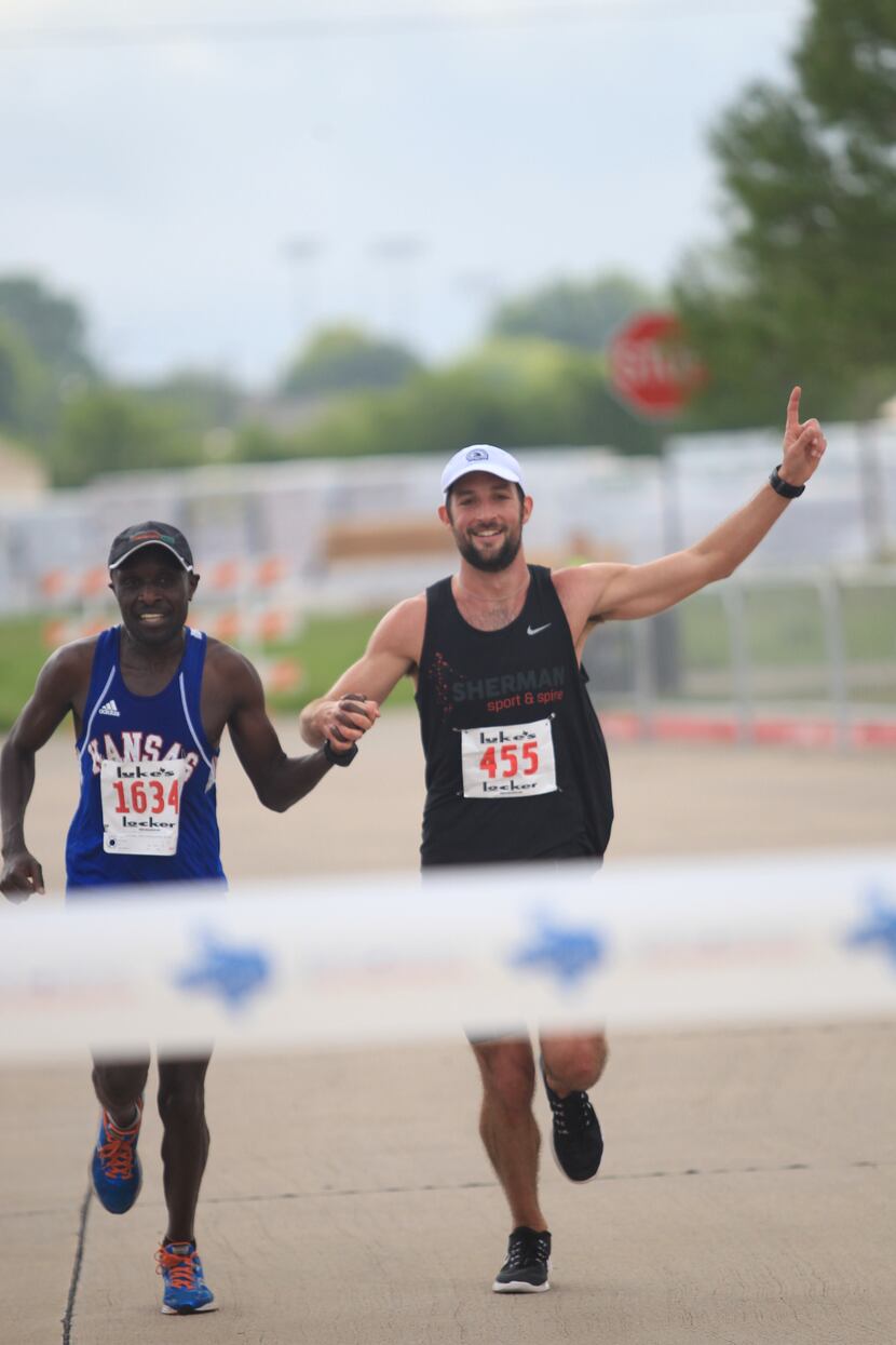 Benson Chesang and Logan Sherman as they finished the 2016 Texas Big Star Half Marathon.