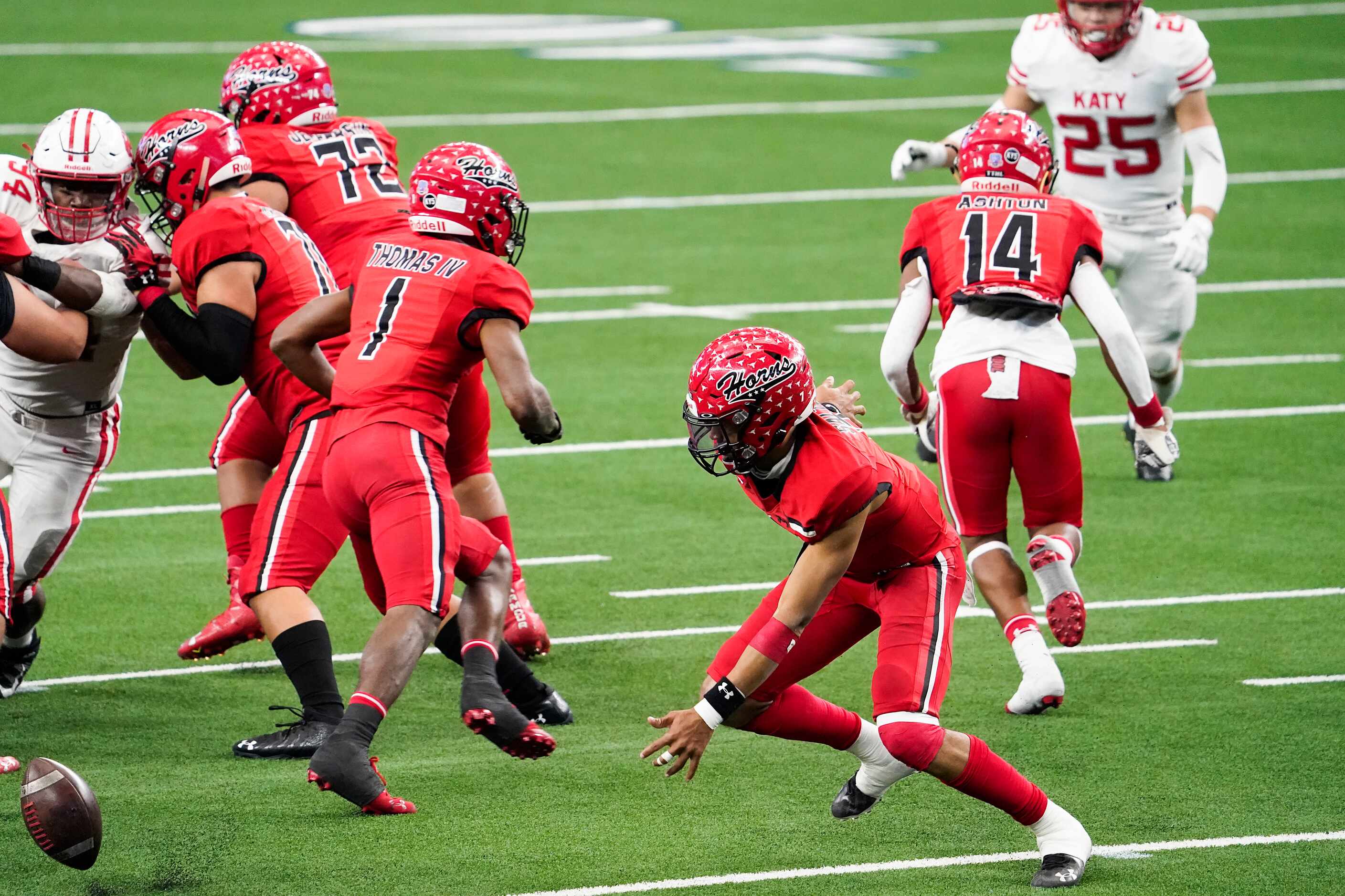 Cedar Hill quarterback Kaidon Salter (7) chases after his own fumble during the first half...