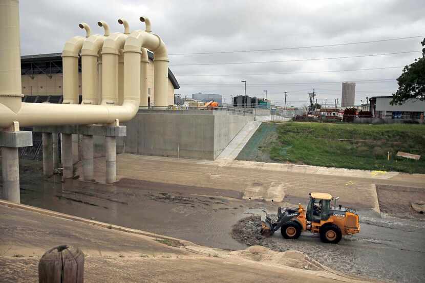 
A Dallas city employee pushed water back Tuesday to the Baker Pump Station, a facility that...