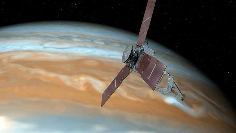 Esta ilustración muestra lo que sería la sonda Juno de la NASA sobrevolando Júpiter.