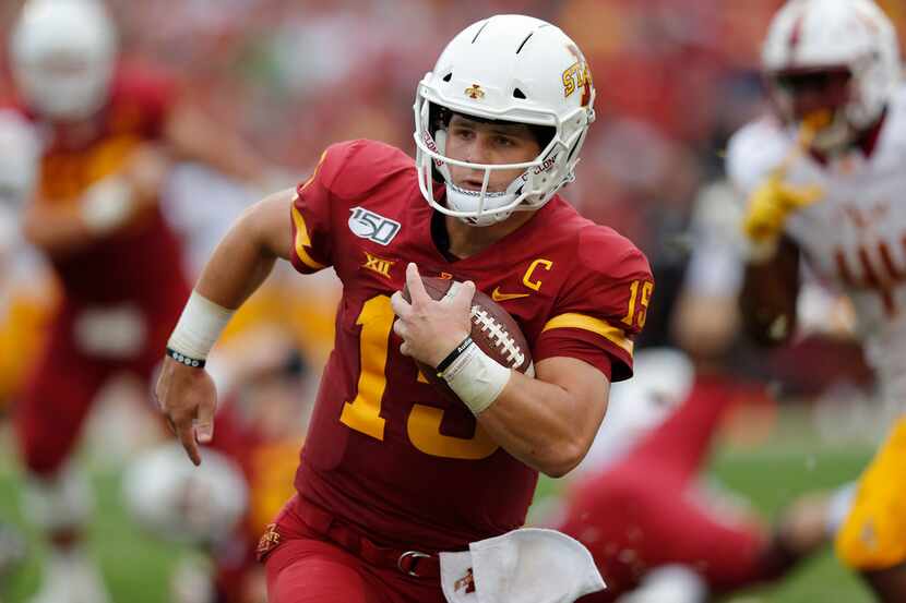 RETRANSMISSION TO CORRECT DATE - Iowa State quarterback Brock Purdy runs the ball for a...