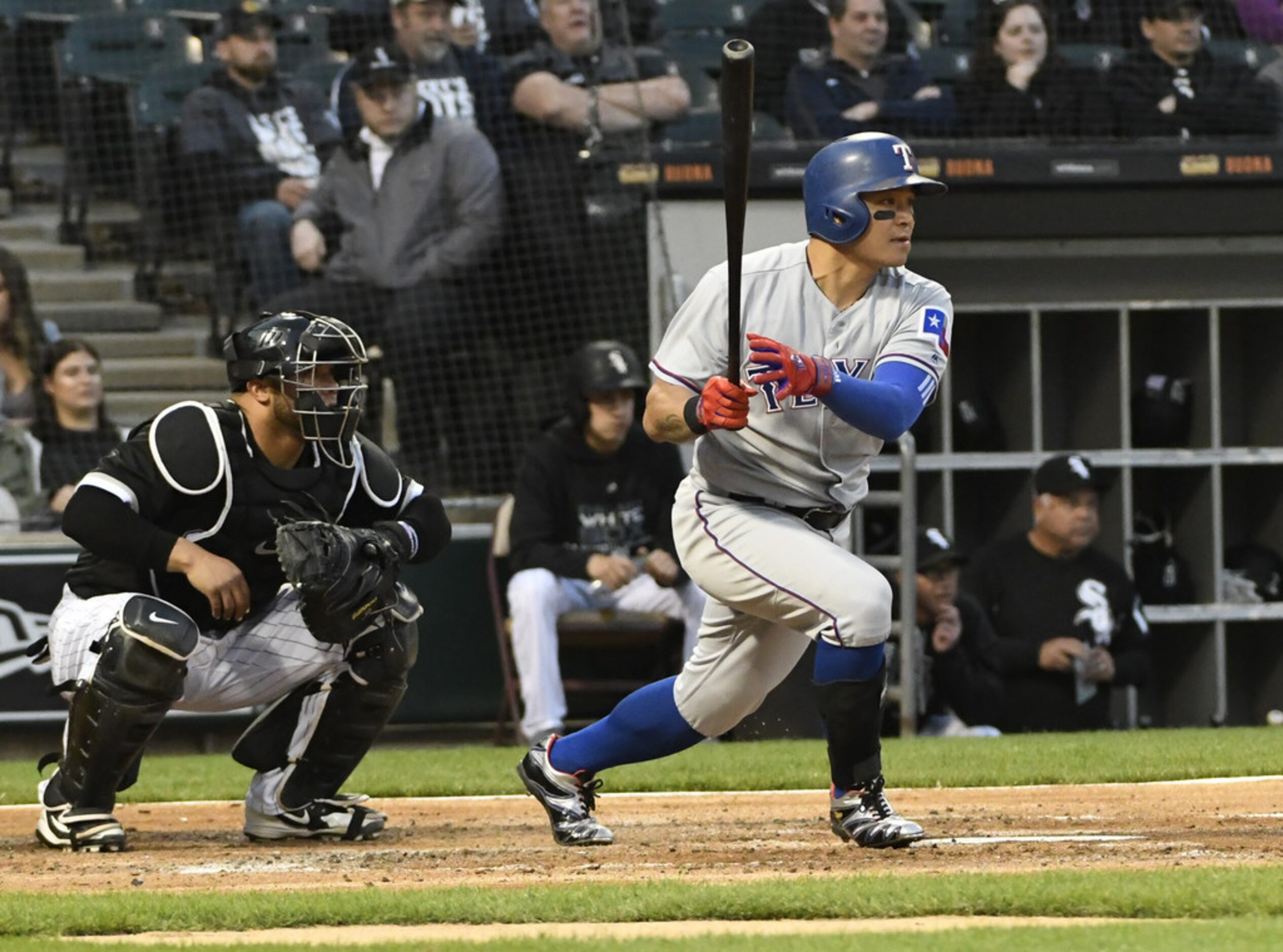 CHICAGO, IL - MAY 17: Shin-Soo Choo #17 of the Texas Rangers hits an RBI single against the...