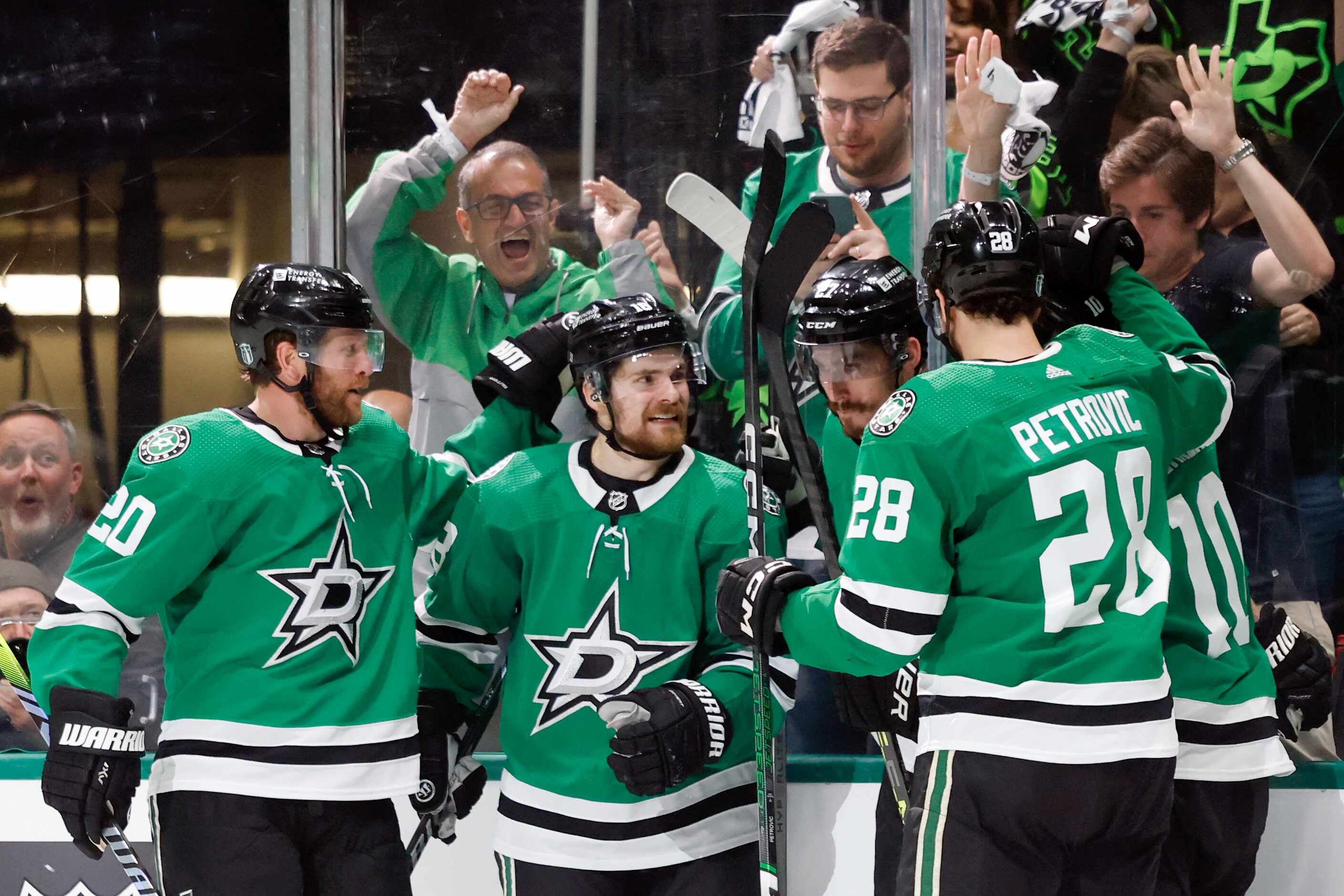 The Dallas Stars celebrate the go-ahead goal by left wing Mason Marchment (27) during the...