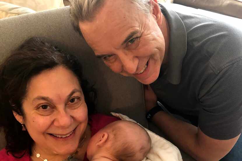 New grandparents Connie and Ed Dufner, with grandson Micah.