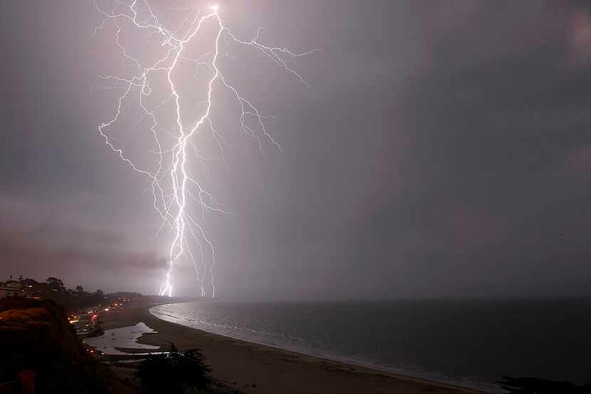 Lightning strikes south of Aptos, Calif., on , Aug. 6.