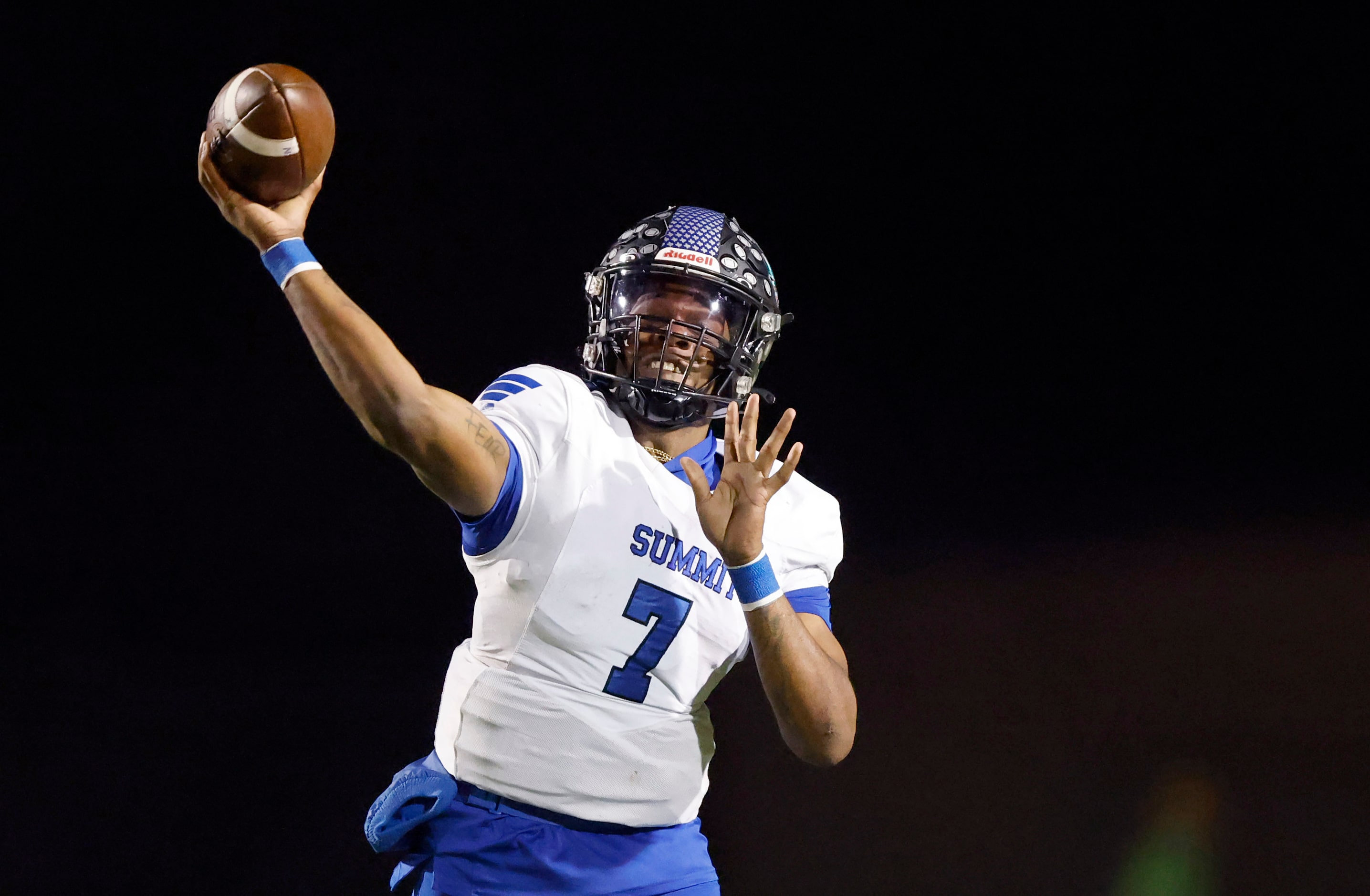 Mansfield Summit quarterback David Hopkins (7) throws a first half pass against College...