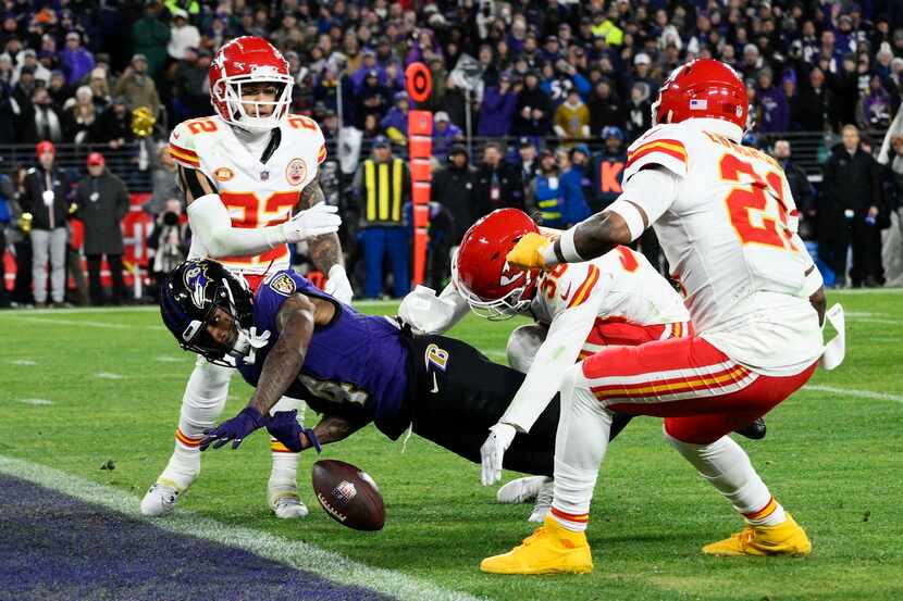 Baltimore Ravens wide receiver Zay Flowers (4) fumbles into the end zone for a touchback...