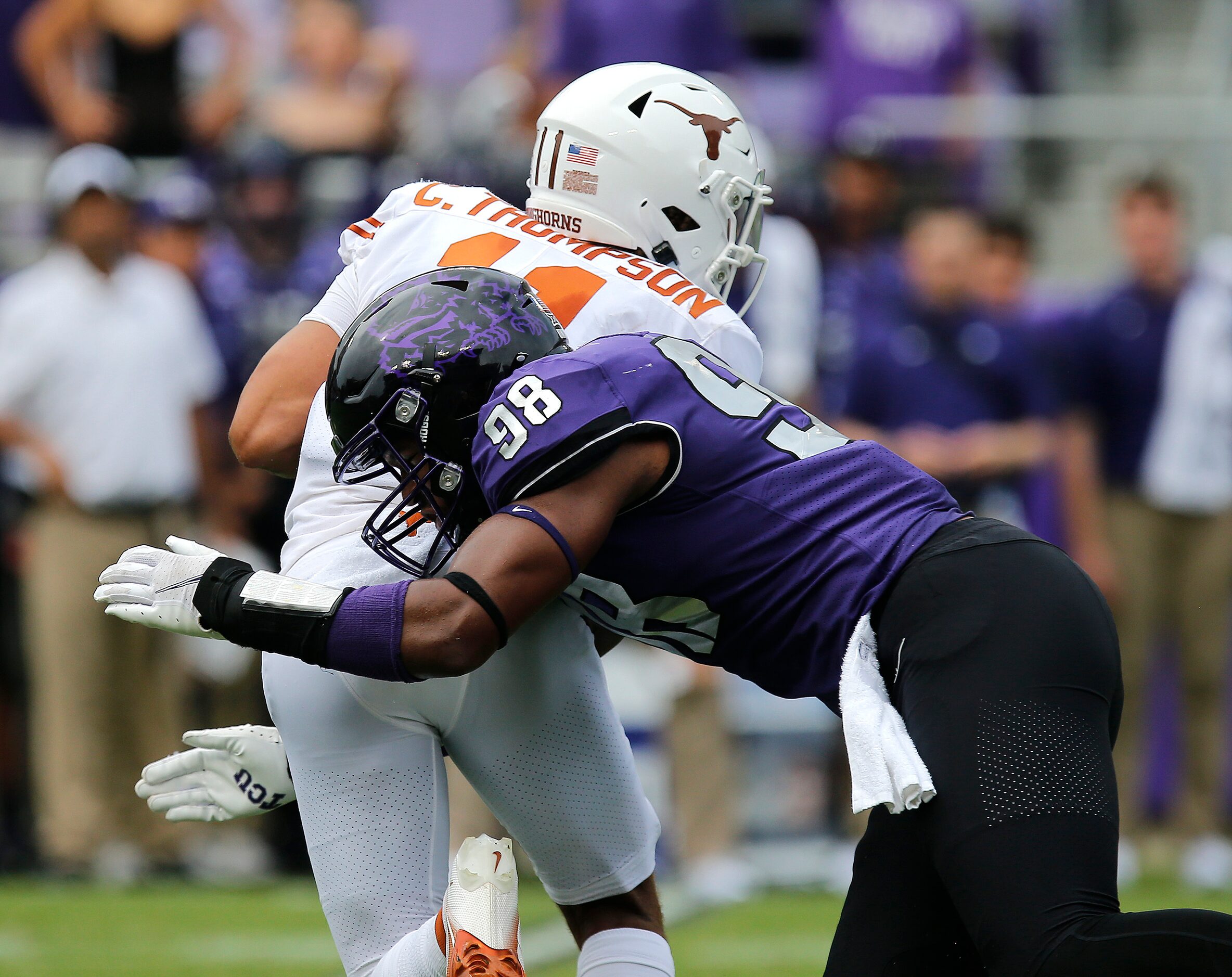 TCU Horned Frogs defensive end Dylan Horton (98) sacks Texas Longhorns quarterback Casey...