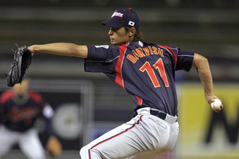 FILE - In this March 17, 2009 file photo, Japan's starter Yu Darvish pitches against South...